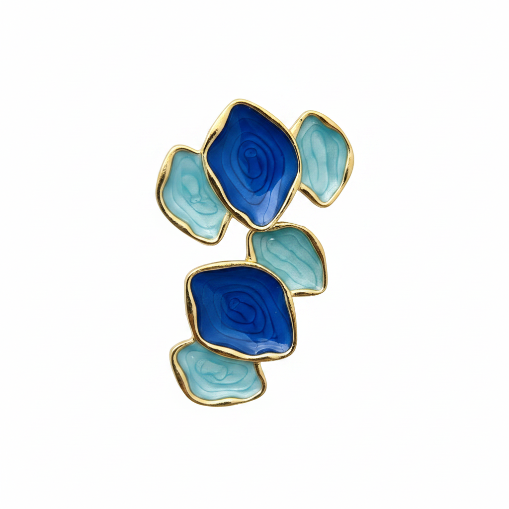 Blue enamel abstract tile statement earrings with gold border on white background