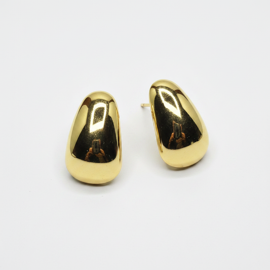 Gold chunky teardrop dome stud earrings on white background