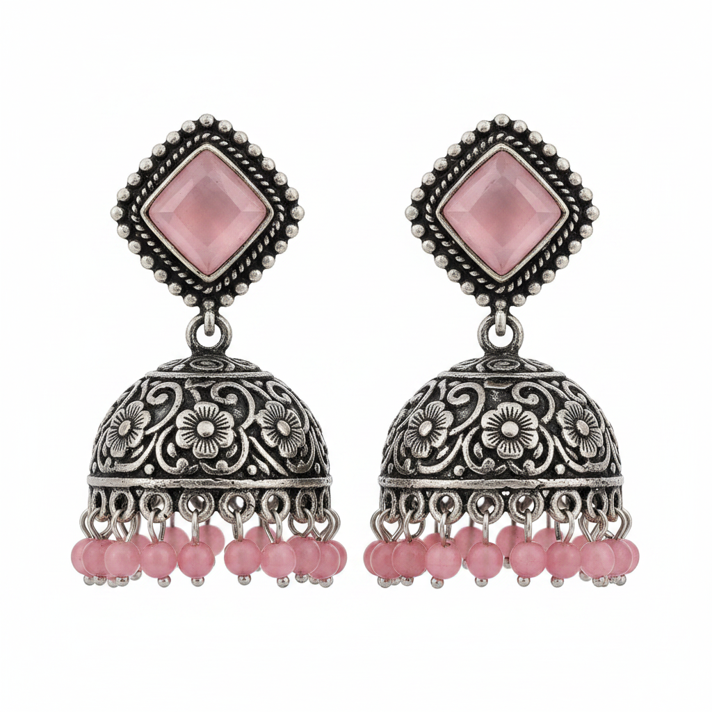Oxidized silver pink rose quartz jhumka earrings with pink bead drops on white background
