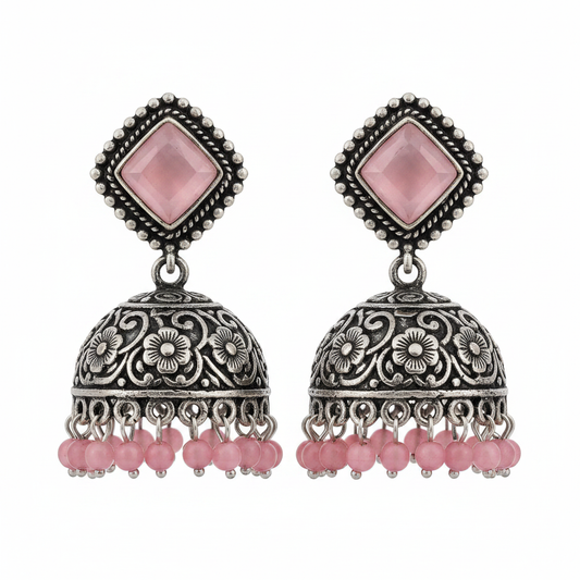 Oxidized silver pink rose quartz jhumka earrings with pink bead drops on white background